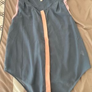 Sleeveless button-down blouse. Blue with pink piping on shoulders and front line